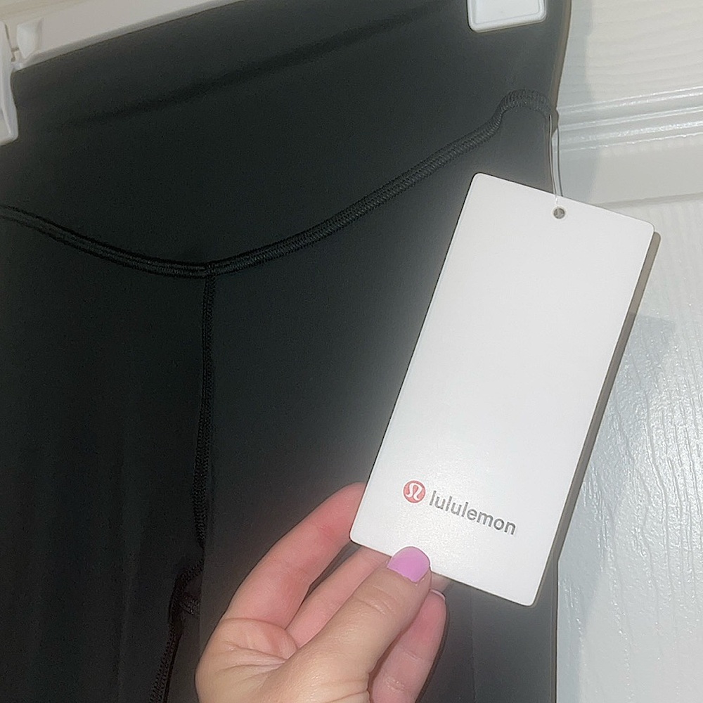 LULULEMON- brand new dark green leggings. Size 4